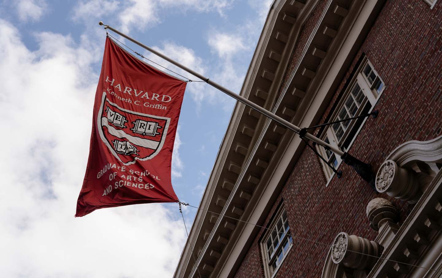 A Graduate School of Arts and Sciences flag on the Harvard University campus in Cambridge, Massachusetts.