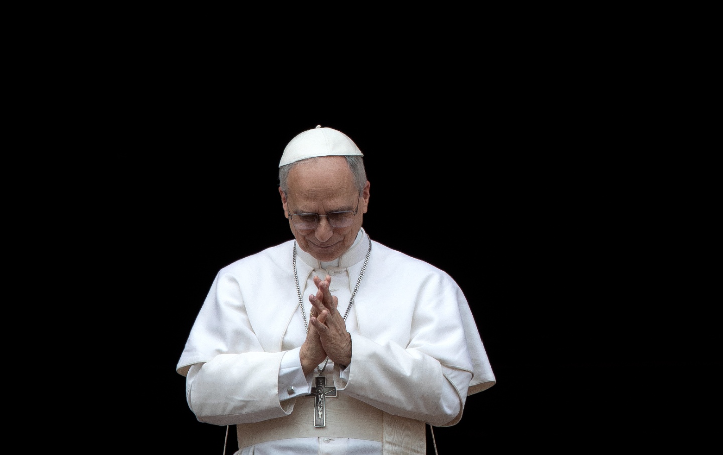 Pope Leo XIV leads his first Regina Caeli prayer from the Central Loggia of St. Peter's Basilica at the Vatican.