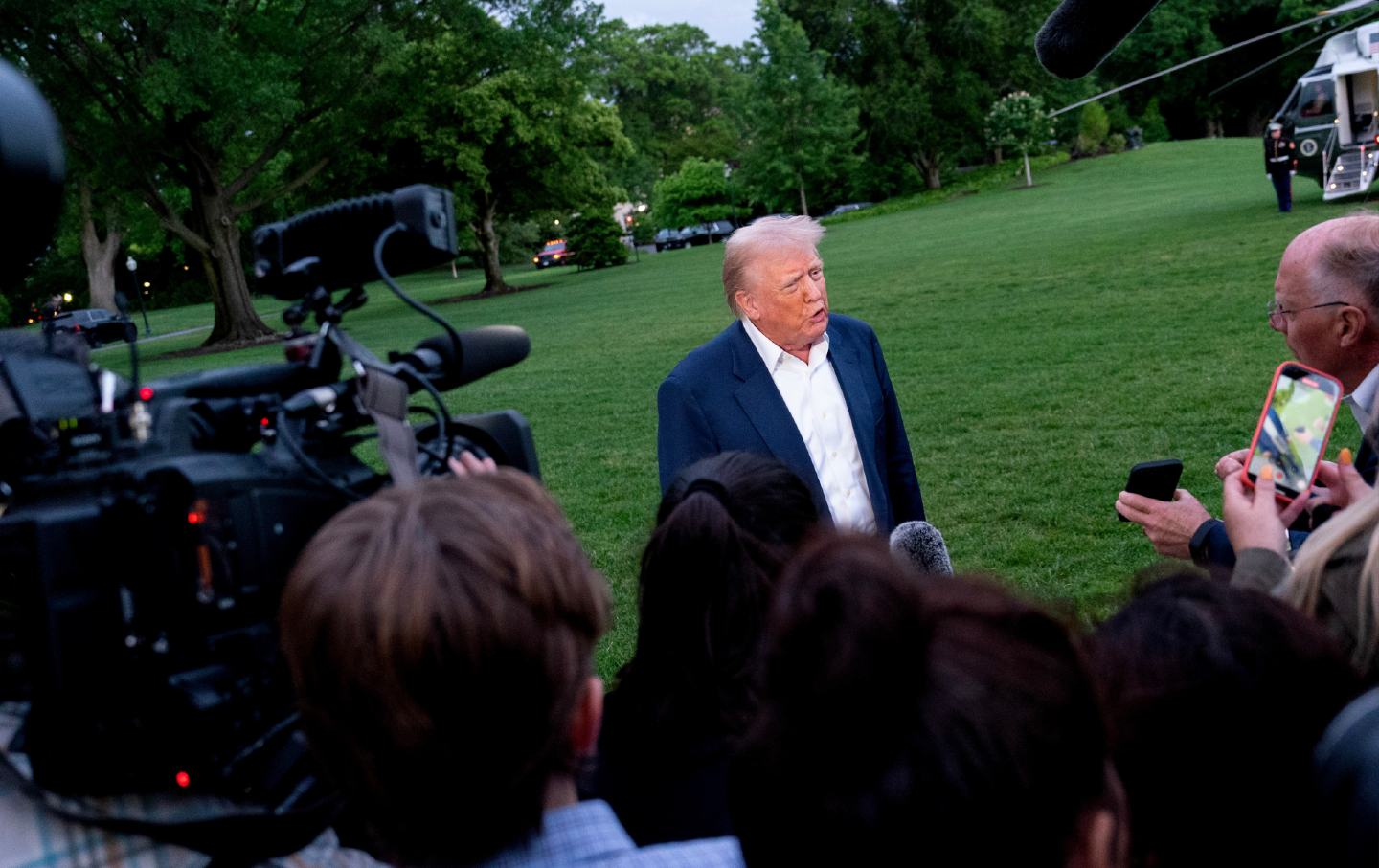 President Donald Trump speaks to members of the media on the South Lawn of the White House in Washington, DC, on Sunday, May 4, 2025.